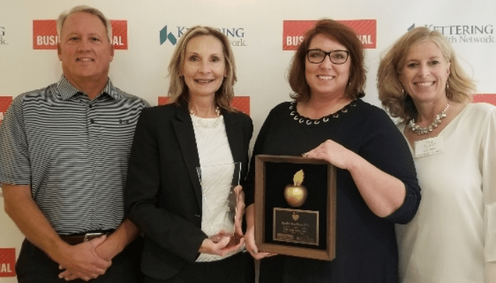 nk parts employees accepting healthiest employer award